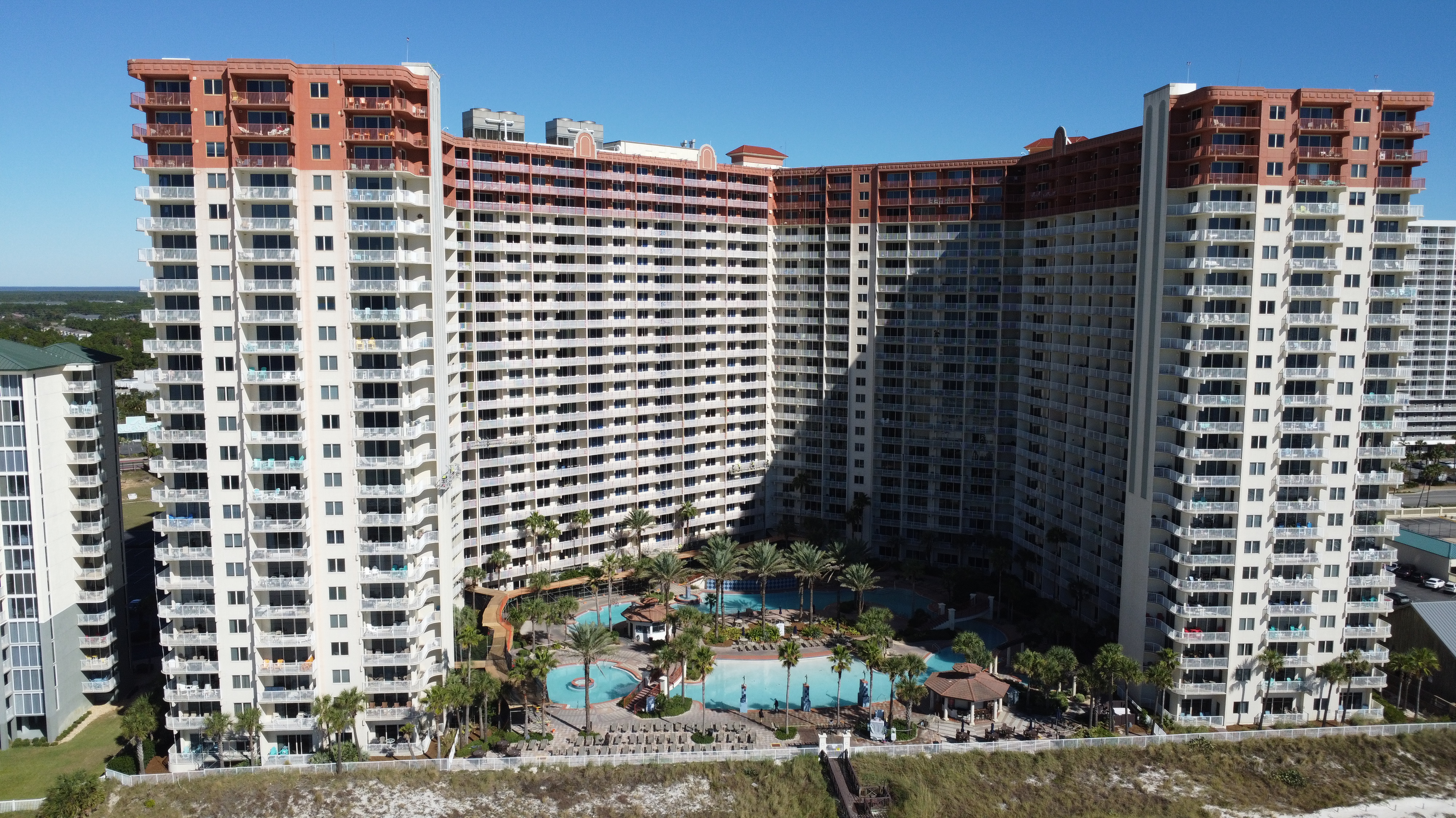 Aerial view of a coastal condominium community.
